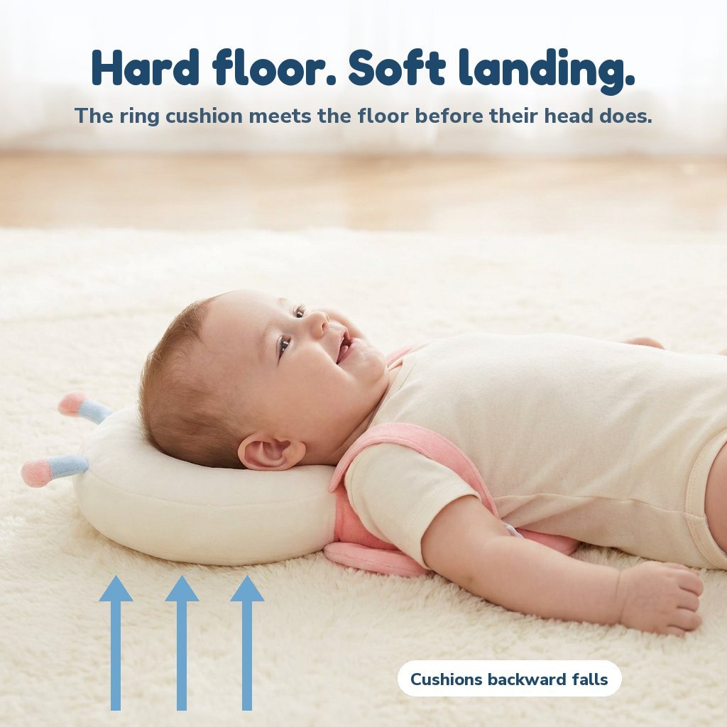 Baby resting the back of the head on the SoftFall ring cushion